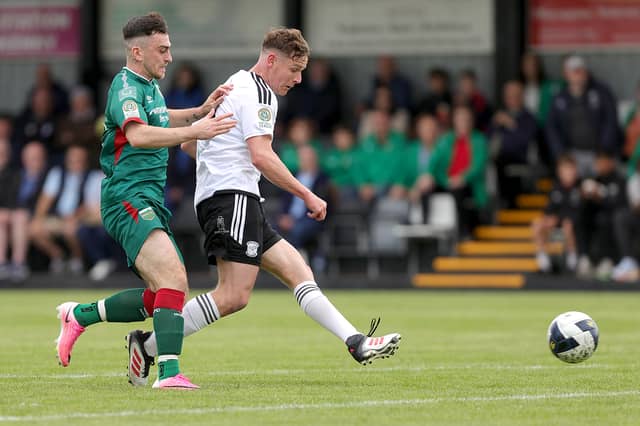 Letterkenny Rovers striker Ronan McHugh slots in their first goal against Mayo in Leckview Park