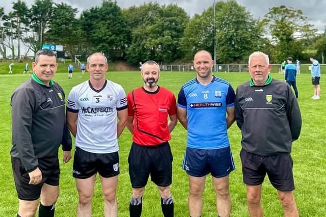 Na Rossa captain Daniel Martin Melly and Moville captain Malachy McDermott with match officials