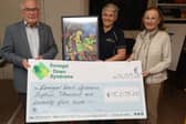 A painting that the late Ronan Roddy painted and presented to Donegal Down Syndrome with the cheque presentation from Louise and her parents, Phil and Maureen.