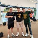 Conan Kearney, centre and his father Robert left and coach John Hutchinson.