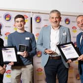 Ciaran Mulroe  is presented with a Seiko Just In Time Award by Joanne Walsh, CEO, Water Safety Ireland (left) and Sean Mulroe  is presented with a Rescue Appreciation Award by Minister Jerry Buttimer, TD, at the 2025 awards ceremony