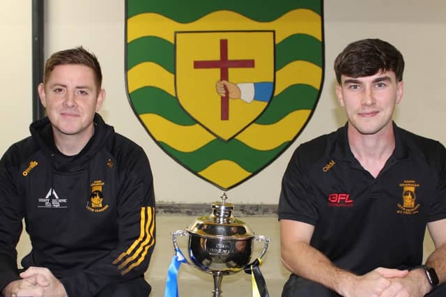 St Eunan's reserve manager Dualtach Molloy and captain Cian McMonagle