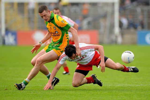 Davey Harte, Tyrone, in action against Kevin Rafferty, Donegal during the 2011 Ulster Championship Semi-Final
