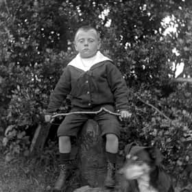 Ian Mc Causland, future proprietor of McCausland's store in Milford as a young boy in 1910. Courtesy of the Donegal County Museum McCausland Collection