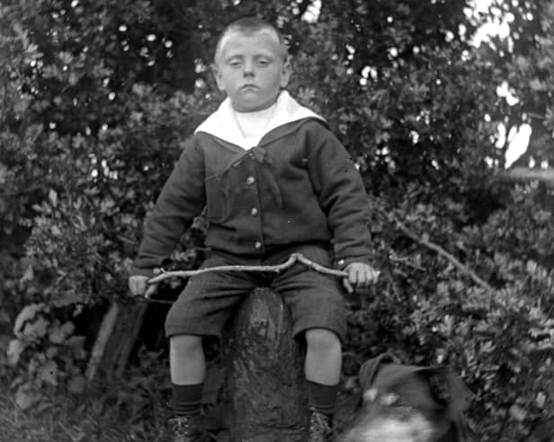 Ian Mc Causland, future proprietor of McCausland's store in Milford as a young boy in 1910. Courtesy of the Donegal County Museum McCausland Collection