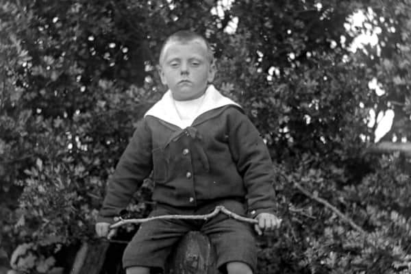 Ian Mc Causland, future proprietor of McCausland's store in Milford as a young boy in 1910. Courtesy of the Donegal County Museum McCausland Collection