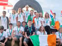 Irish Junior Surfing Team in Bundoran, with Isabella O'Reilly in the centre with Irish flag