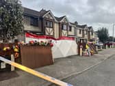 Floral tributes outside the house in Waterford