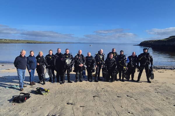 The large group of experienced divers conducted three in-water training drills 