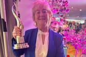 Rena Donaghey, Chairperson of Buncrana Tidy Towns, pictured with the trophy after Buncrana was crowned Ireland’s Tidiest Large Town for 2026 at the SuperValu TidyTowns awards.