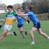 Tiernan McGonagle get a shot away for Buncrana