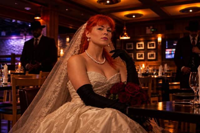 Work with your table to make your final accusation at the Mafia Wedding