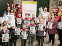 Raphoe Central National School children with copies of Reimagining Granny's Wonderful Chair  