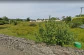 The site in Culdaff village where 23 residential units are proposed, subject to planning permission.