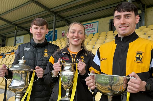 Conor, Ciara and David O'Donnell with the championship trophies they won this season