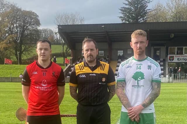 Captain PJ Browne and Matthew Flood with referee Derek Argue