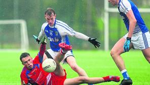 Coláiste Cholmcille in tight battle as they trail by a point at half time