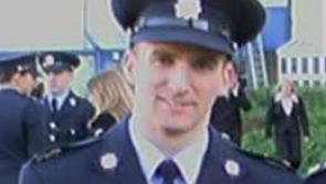 Gardaí pay tribute to Garda Robert McCallion on the anniversary of his death

