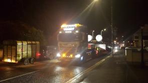 Tilting at windmills:  Traffic comes to a standstill  in a Donegal town as wind farm parts breeze past