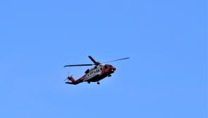 Coast Guard and R118 helicopter assisting gardaí in missing person search in Donegal