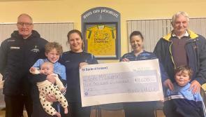 Christmas comes early as  Aoife gets her winning cheque from Moville GAA club