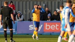 Stephen McLaughlin hits the net for Mansfield Town in defeat to Doncaster