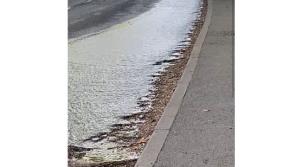 Burst water main leaves a mini-river running down Letterkenny road