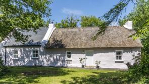 Over a century-old thatched cottage oozes traditional charm and character