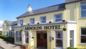 Arnolds Hotel marks its  centenary with the publication of a new book by the Dunfanaghy Writers Circle