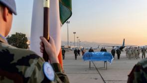 Body of Private Seán Rooney leaves for Ireland after comrades pay respects