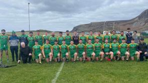 Naomh Columba brave the elements to see off Milford in Division 2