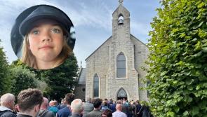 A deep serenity and dignified silence descended as Zara (10) laid to rest