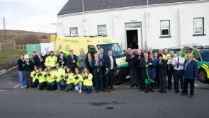 Delight on Arranmore with volunteers picking up certificates and a new ambulance 