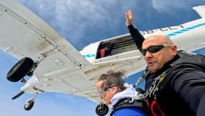 Watch: Daring 92-year-old Donegal woman completes charity skydive in memory of son