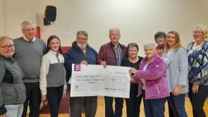 Cheques presented from fundraisers at night in memory of the late Noreen McGarvey