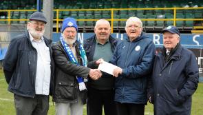 Lucky Jack Quinn presented with Finn Harps lotto jackpot cheque
