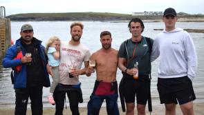 Three men paddleboard from Sliabh Liag to Bundoran to support youth counselling
