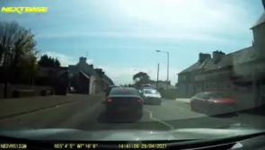 WATCH: Horrifying footage as 'joyrider' slams into two Garda vehicles and a building  in small Donegal village