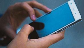 Warning about spyware hidden behind links in text messages 