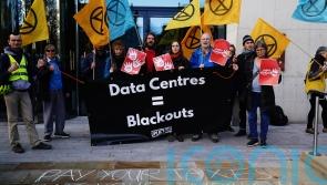 Crowd gathers at Amazon’s European HQ as part of worldwide Black Friday protest