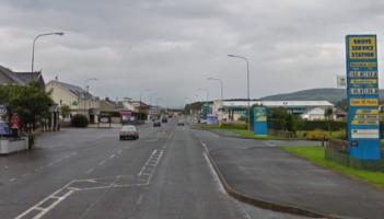 Drunk man was walking in road with a bottle of wine in his hand when gardai arrived