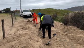 Watch: Some hard graft needed to clear road in Inishowen following sand storm