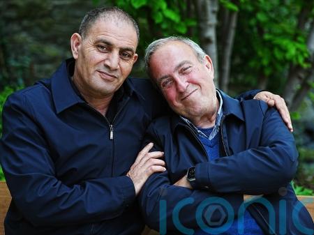 Bereaved Israeli and Palestinian fathers now call each other brother