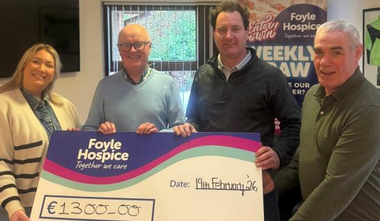 Crana Swimmers generously donate &euro;1,300 to Foyle Hospice, proceeds of festive dip