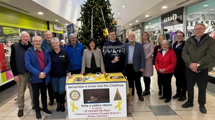 Rotary Club members opening of the Yellow Ribbon Christmas Tree in Letterkenny