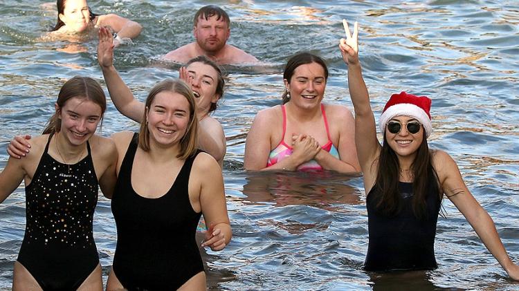 In pictures: Brrrrrrr-ave dippers take to Creevy Pier on Christmas morning