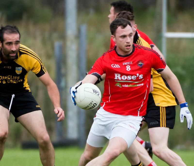 St Michael's Martin McElhinney in action against Malin McElhinney in action against Malin