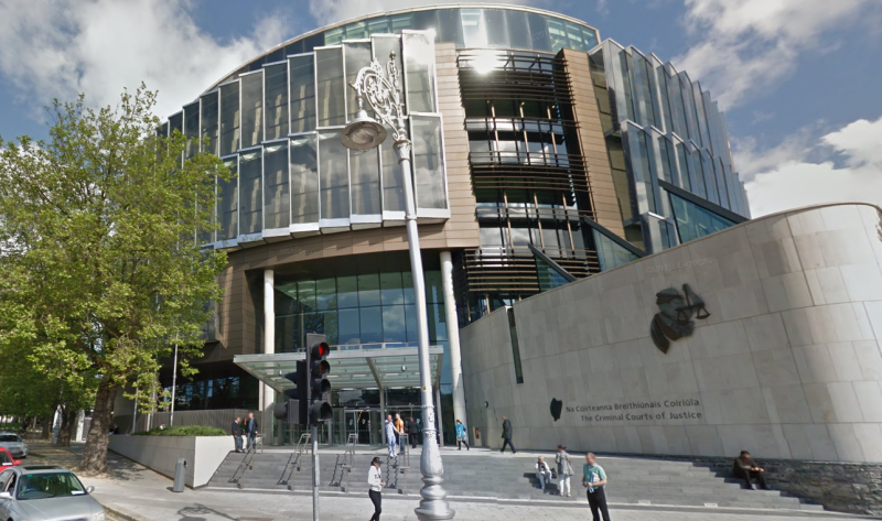 Men found in burning car at Ravensdale died of gunshot wounds to heads, court hears