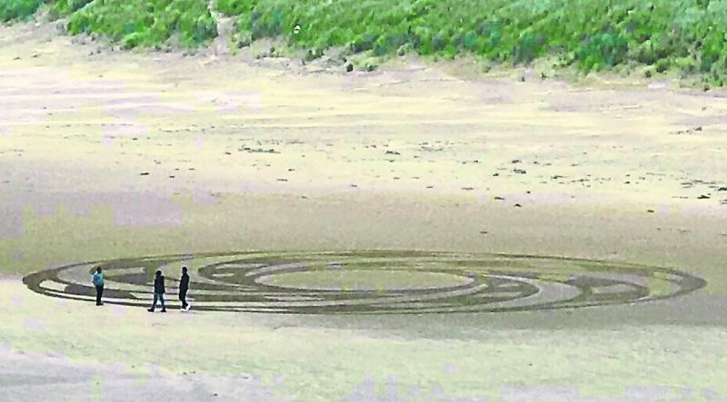 Many people enjoyed seeing the sand art on Tullan Strand recently