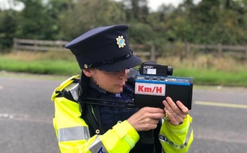 A Garda at a roadside speed check 